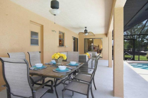 Electric-heated pool home on Gulf-access canal with bikes - Villa Ellie Mona